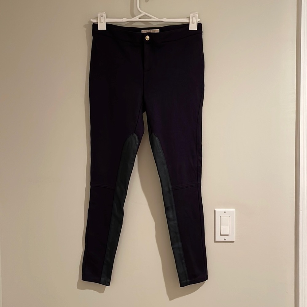 Michael Kors Navy zip and snap fly.  Inside leg leather-look.  See photos. 8P